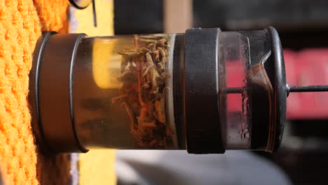 tea being brewed in a tea infuser