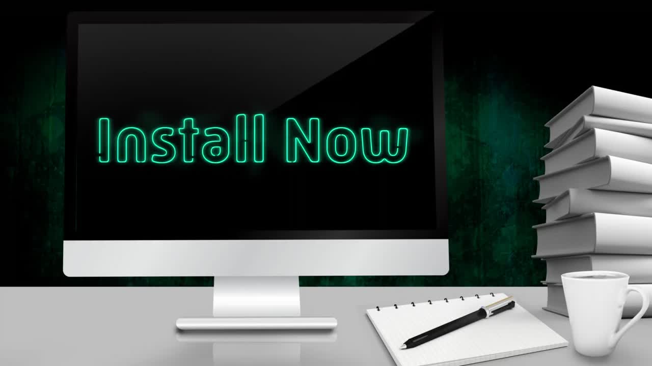 animación de palabras instalar ahora parpadeando en la pantalla de la computadora de escritorio de pie con libros en el escritorio