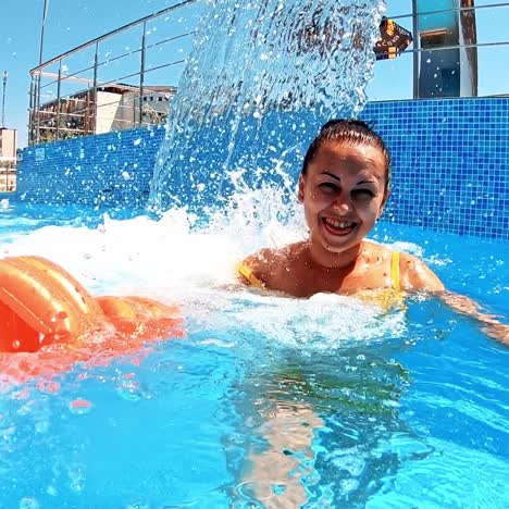 beautiful girl enjoying in pool