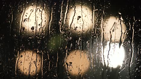 various shots and camera movement of detailed rain drops falling on window