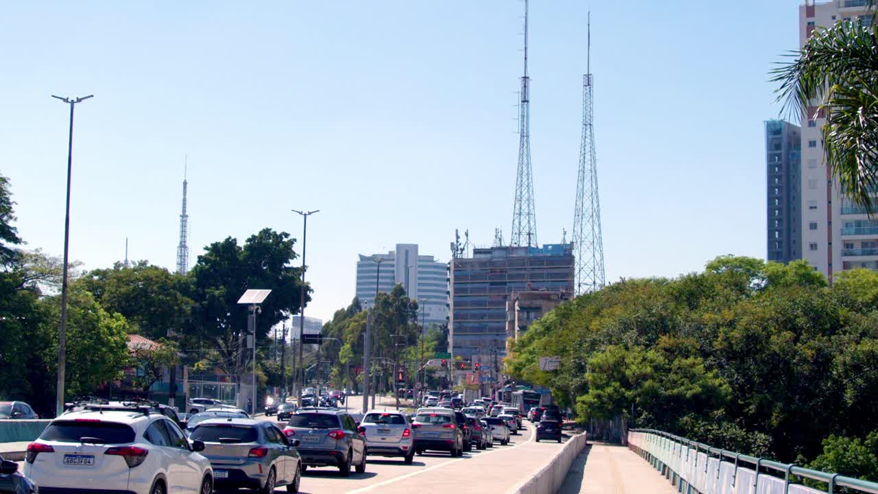 City traffic, a bustling show, stop-and-go where time moves slow