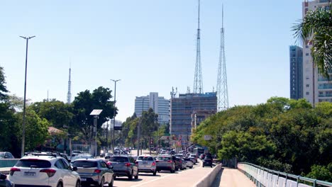 city traffic, a bustling show, stop-and-go where time moves slow