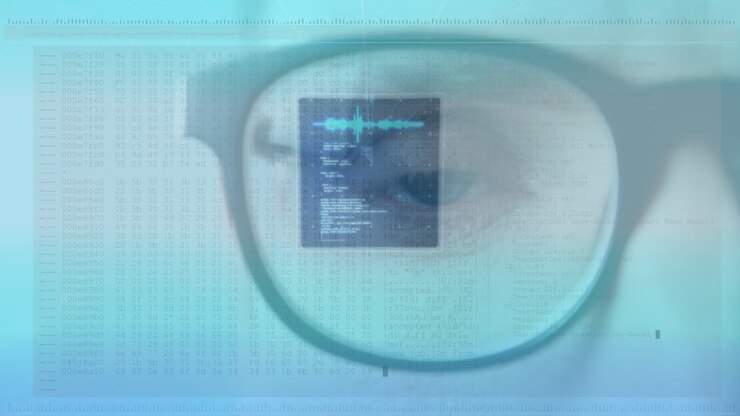 Animation af databehandling over en mands blå øje og briller