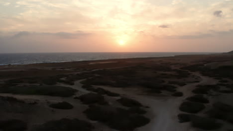 fly backwards arashi dunes at sunrise in aruba