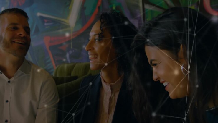 Animation of connections over diverse business people talking in office