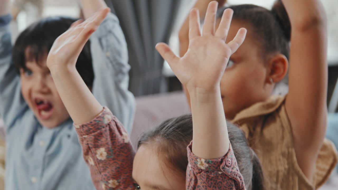 Cute Children Waving Hands