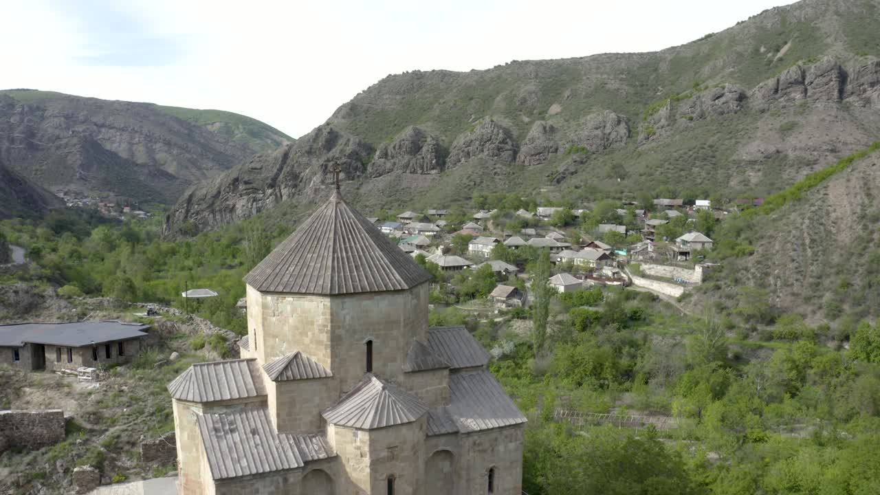 The Historical Ancient Building Of Ateni Sioni Church, Georgian Orthodox Church In Kaspi, Georgia On A Bright Sunny Day. - crane shot