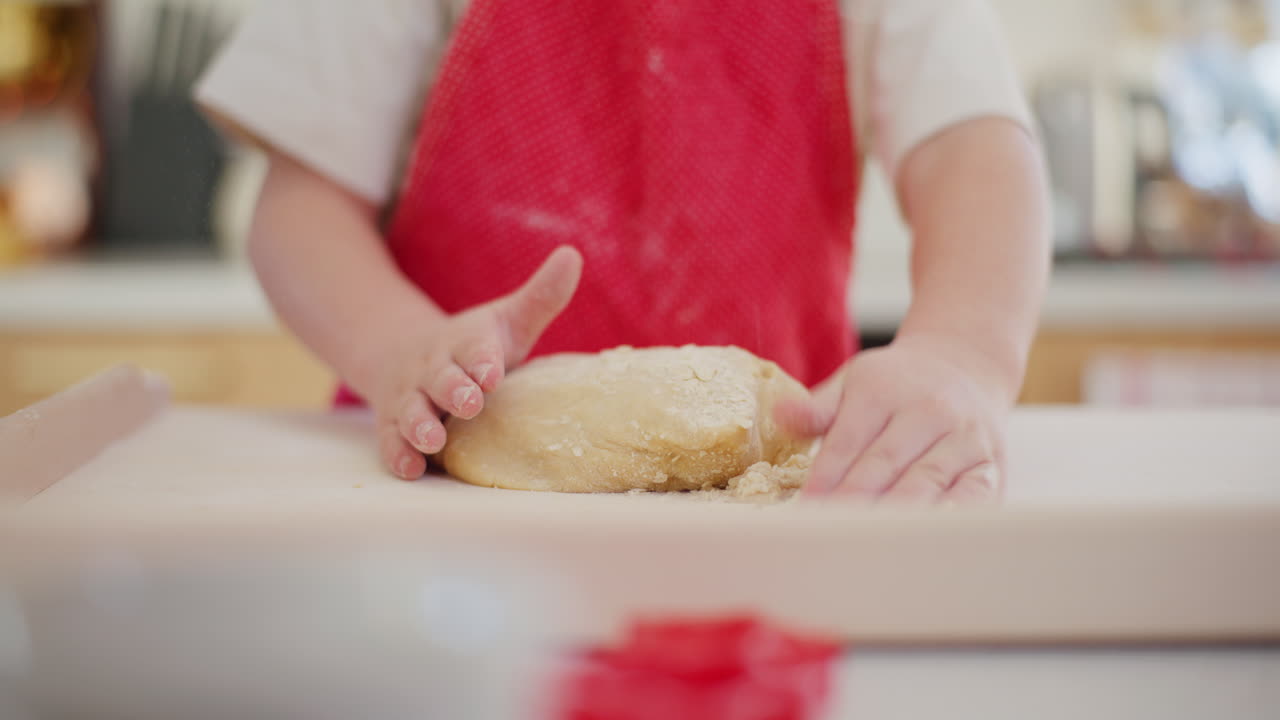 Boy Kneading Dough Close Up Of Hands