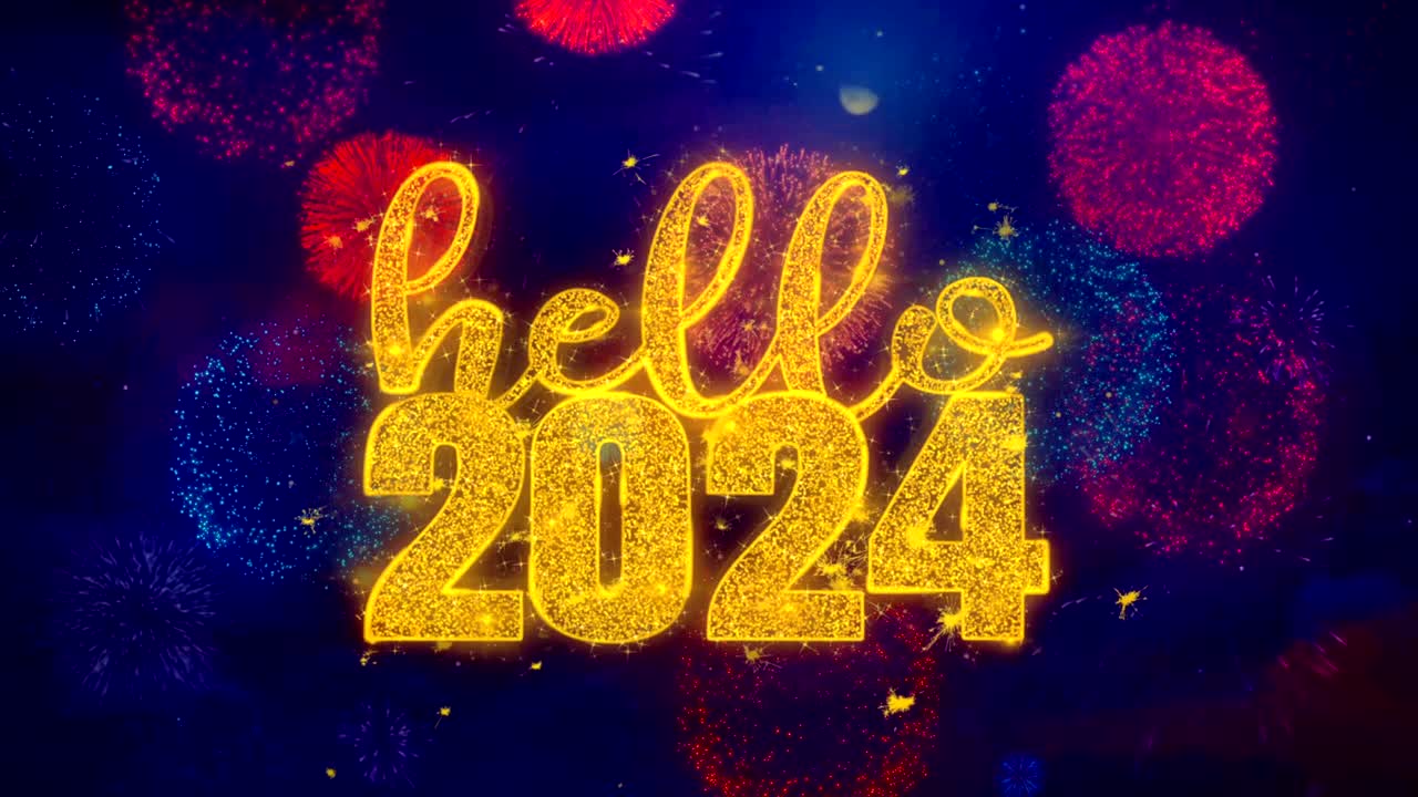 hola 2024 texto de deseos en las coloridas partículas de explosión de fuegos artificiales.
