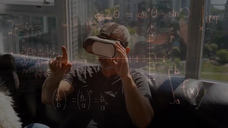 Animation-of-mathematical-drawings-and-equations-over-man-wearing-vr-headset