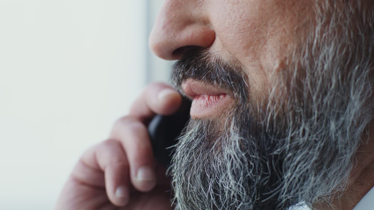 Close-up of a Man on the Phone