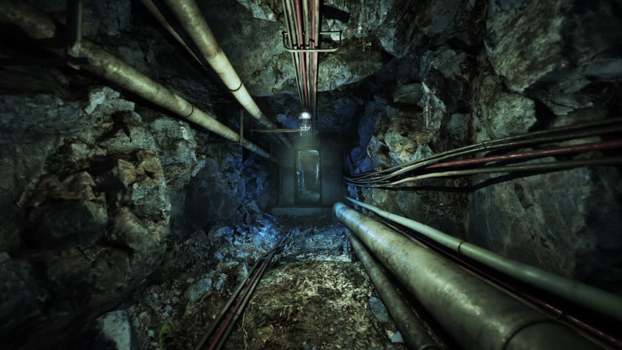 Dark underground bunker passage with pipes and rock walls during exploration