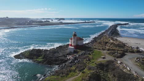 stunning 4k aerial drone shot showcasing coquille river lighthouse as well as sea out into the pacific northwest