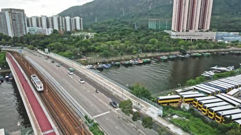 Light-rail-and-cars-crossing-a-bridge-over-a-canal