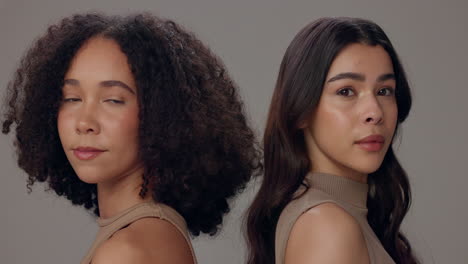 two young women smiling at the camera
