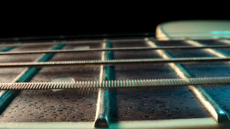 close-up of a guitar fretboard