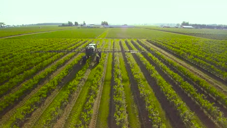 a crop sprayer prepares itself for work.