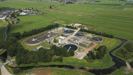 drone view of a wastewater treatment plant in the netherlands, located near volendam. this facility is essential for clean water management and environmental protection in the region