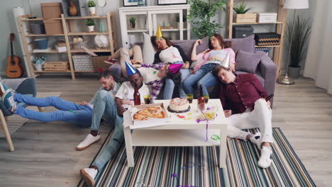drunk friends sleeping after a party
