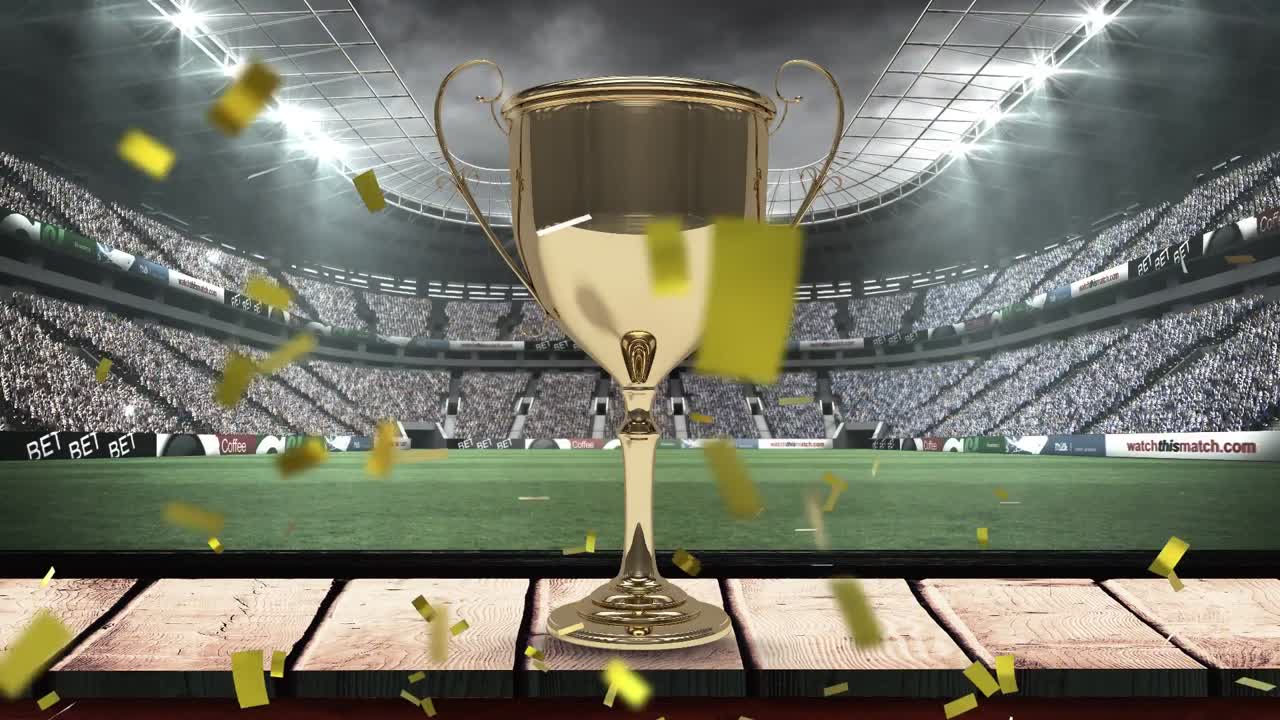 럭비 필드 스포츠 경기장에서 금컵 위로 떨어지는 콘페티의 애니메이션