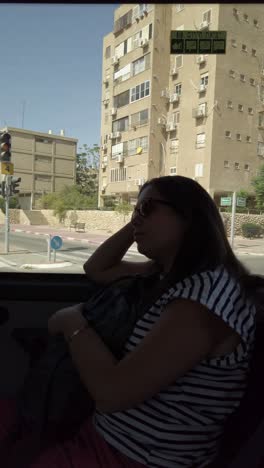 woman on a bus in an israeli city