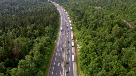 emergency lane forming on european highway due to a car accident and heavy traffic in summer time