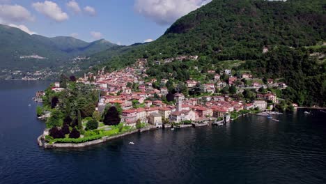 aerial toward the vibrant village of torno on lake como, italy