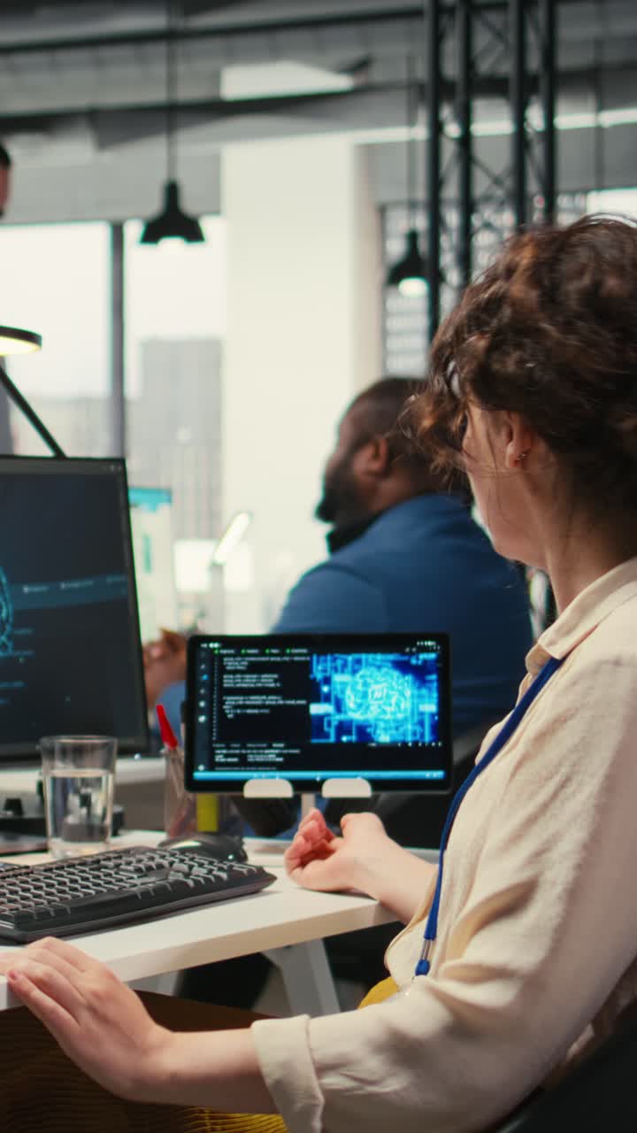 Vertical Video Office administrator checking monthly reports with AI analytics platform
