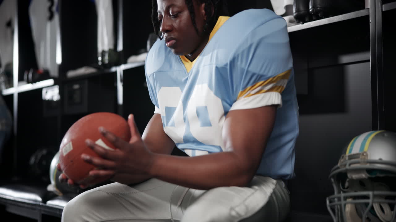 Football player in locker room