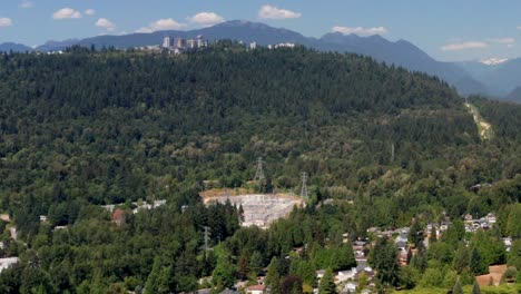 the simon fraser university located by the burnaby mountain in canada - aerial shot