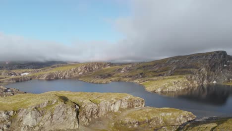 glacial lake meltwater and rock hills, hardangervidda, norway subarctic, aerial