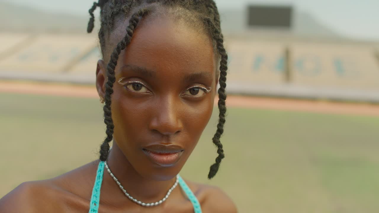 Portrait Of Beautiful African American Woman Looks Straight At The Camera