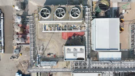 rone view of industrial fibre production plant with piping and cooling fans in uk