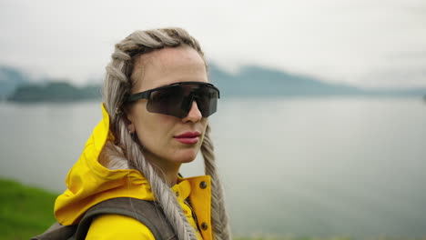 woman hiking by the lake