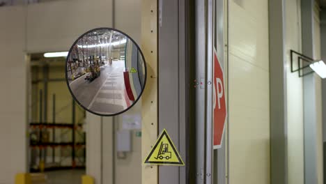 warehouse safety with forklift and mirrors