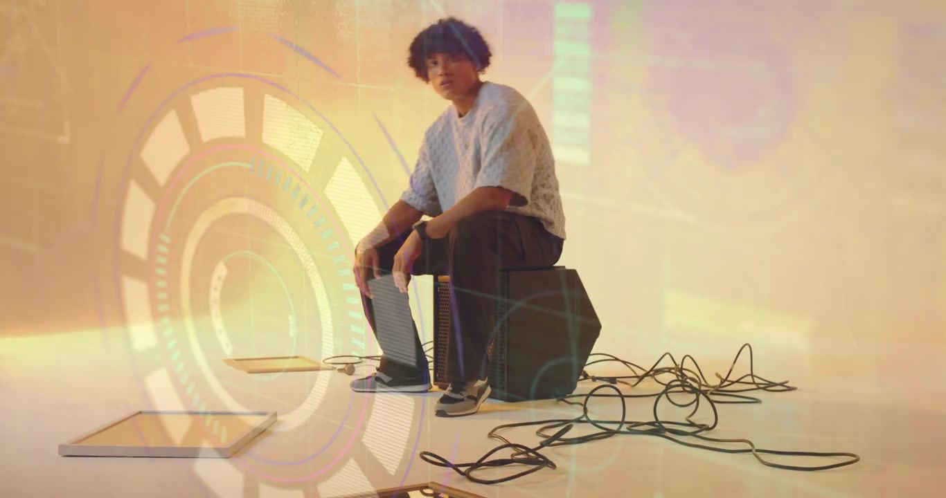 Man stepping over cables, testing floor panels and activating HUD behind speaker in audio demo
