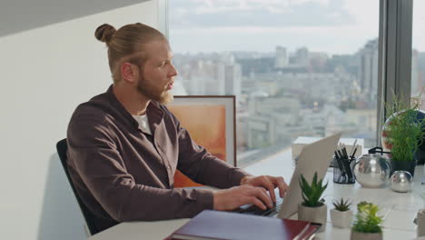 calling woman asking partner windows place close up. focused man texting laptop