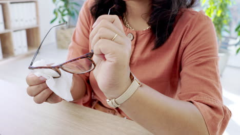 woman hands, cloth or cleaning glasses in clear