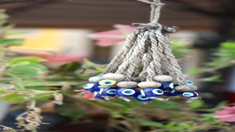 evil eye charm decorated with beads