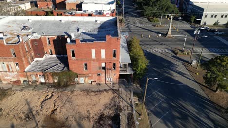 sliding drone shot of the backside of the abandoned former bluff city inn in eufaula alabama built in 1885