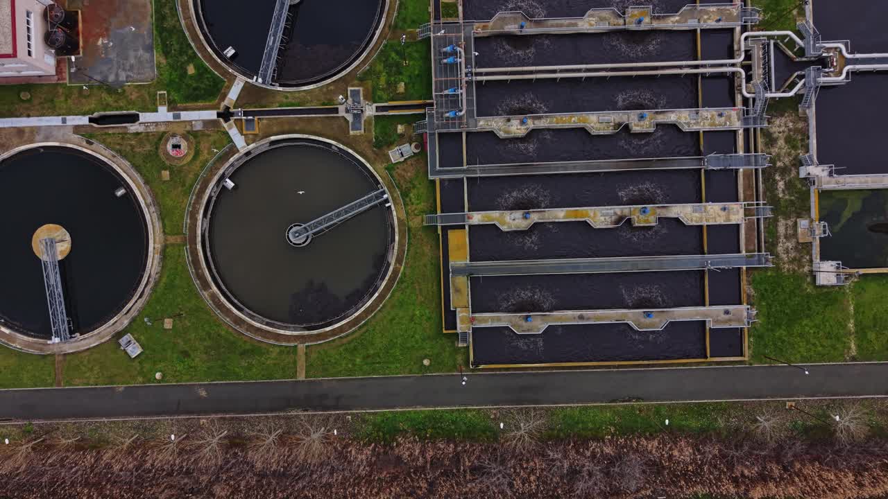 View of water treatment facility and surrounding landscape in urban area