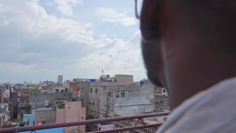 man flying kite