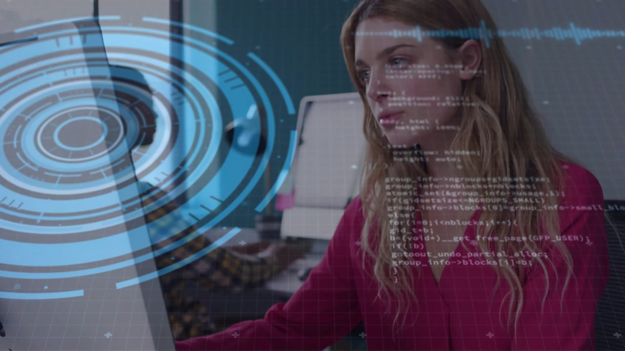 Female developer typing and scrolling at desk, causing blue HUD and code growing for review