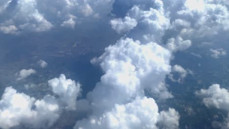 beautiful aerial view seen through window of flying airplane