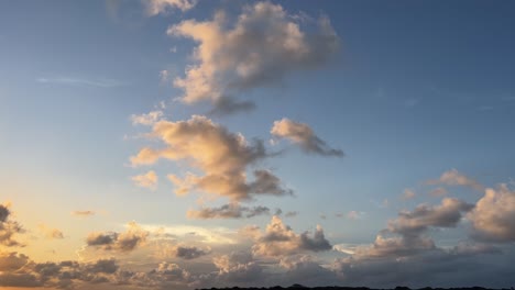 beautiful handheld shot of a vibrant golden sunset summer sky in tibau do sul, brazil near pipa in rio grande do norte on a warm summer evening during golden hour