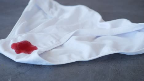 white underwear with blood stain