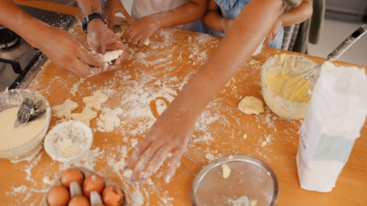 Hands, heart and ingredients with a family baking