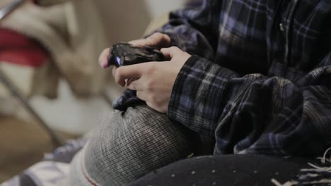 Toronto,-Canada---A-Boy-Playing-Video-Games-With-A-Gaming-Joystick---Closeup-Shot