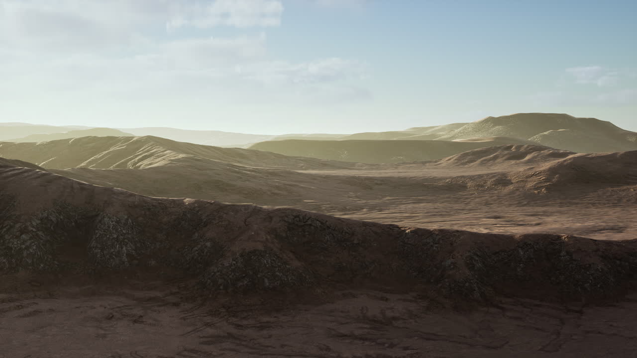 Sunset over the sand dunes in the desert