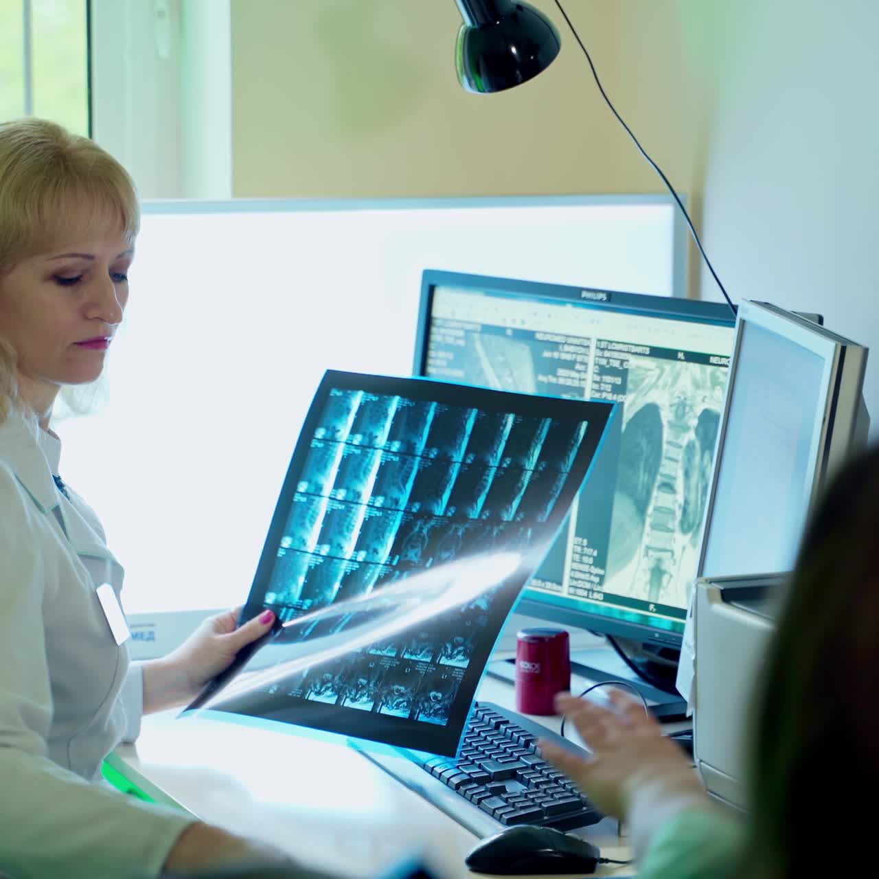 Doctor examining x-ray images